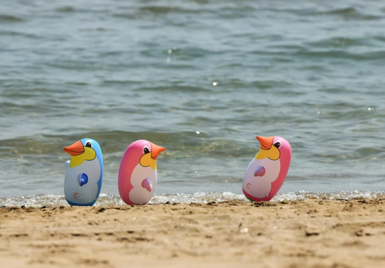 Penguins Toys on Beach
